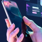 Hand holding a smartphone with floating app UI elements – futuristic app development concept.
